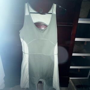 Fabletics Kids Bodysuit in Olive and Cream